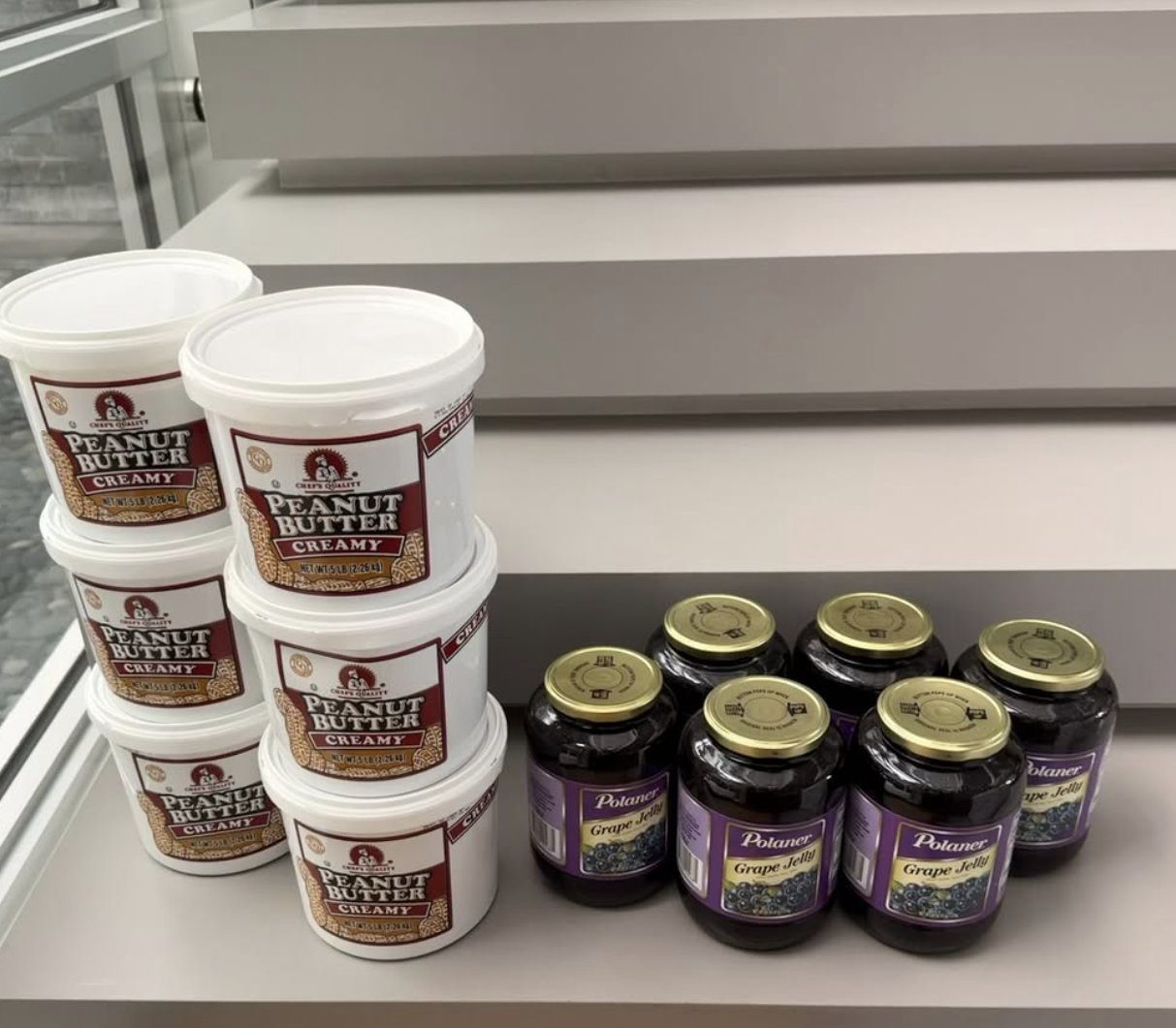 Donated peanut butter tubs and grape jelly jars